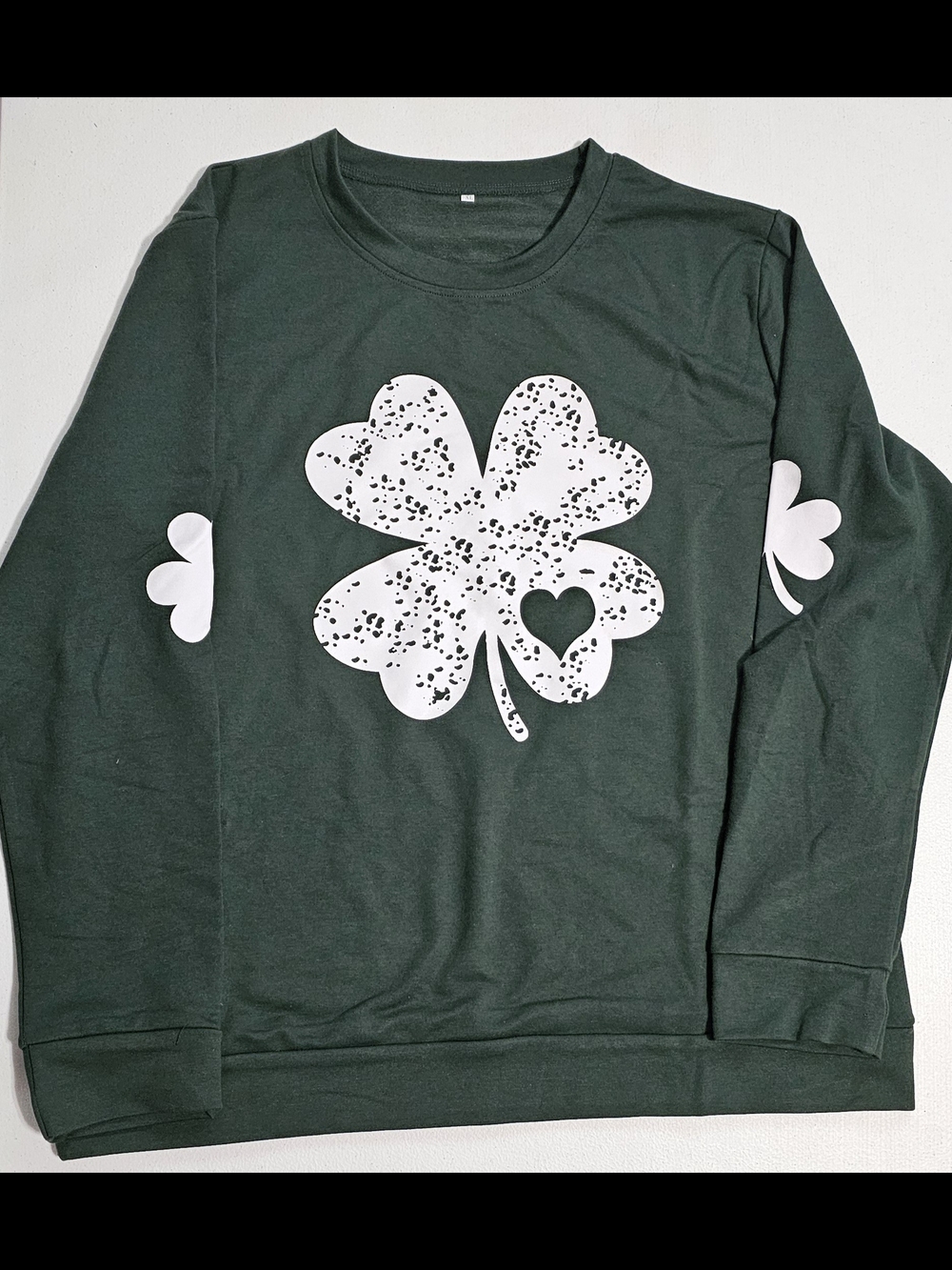 Dark Green Sweatshirt with White Four-Leaf Clover Graphic
